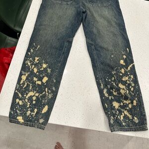 Anthropologie Blue Jeans with Tan Splatter Design